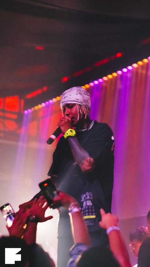 A Friday night performer in front of the crowd